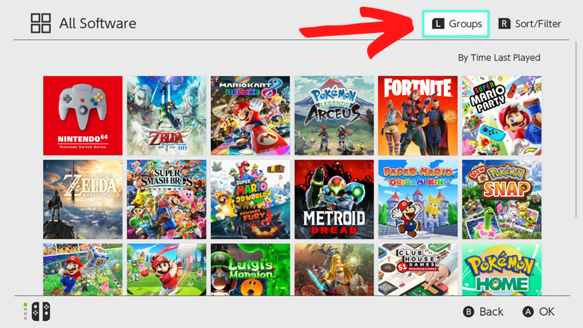 La pantalla de la Biblioteca de software de Nintendo Switch que muestra una flecha roja que apunta al botón Grupos.